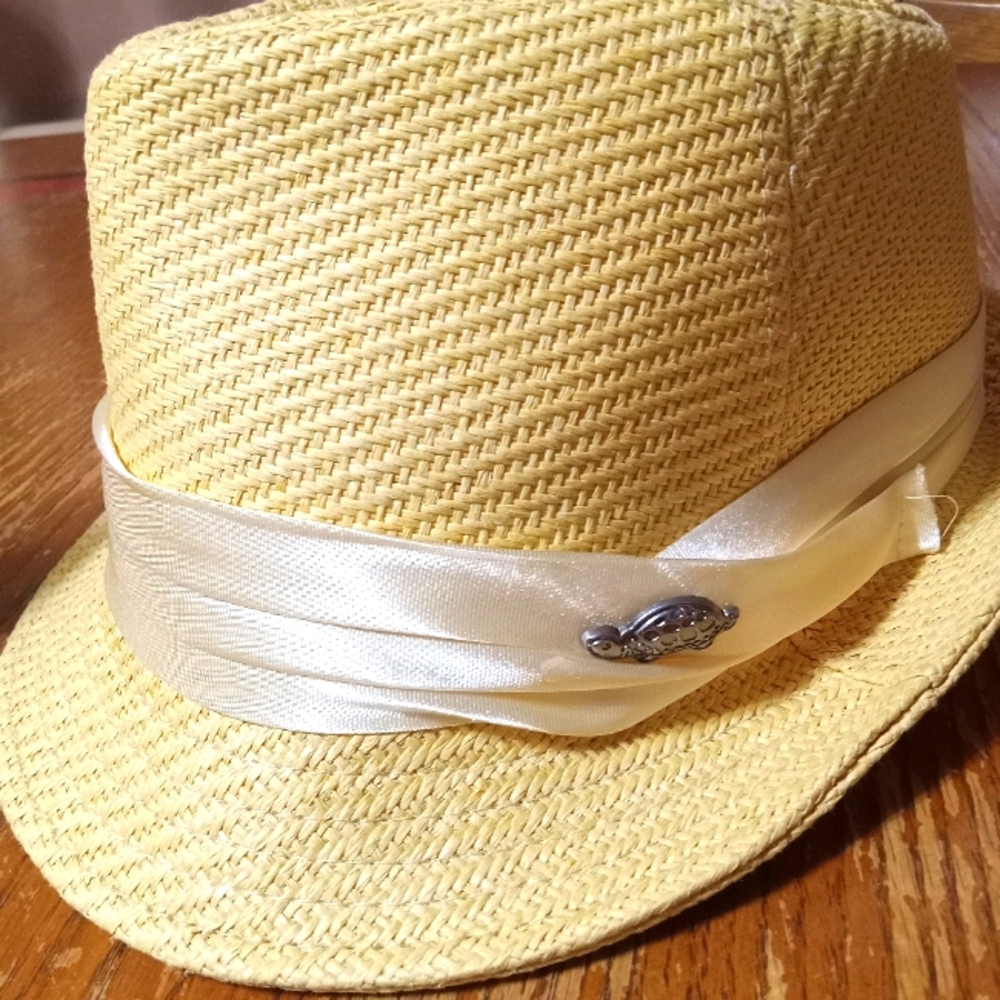 A Pamoa Lg/XL Fedora style hat never worn w/ a cream band & metal turtle emblem.